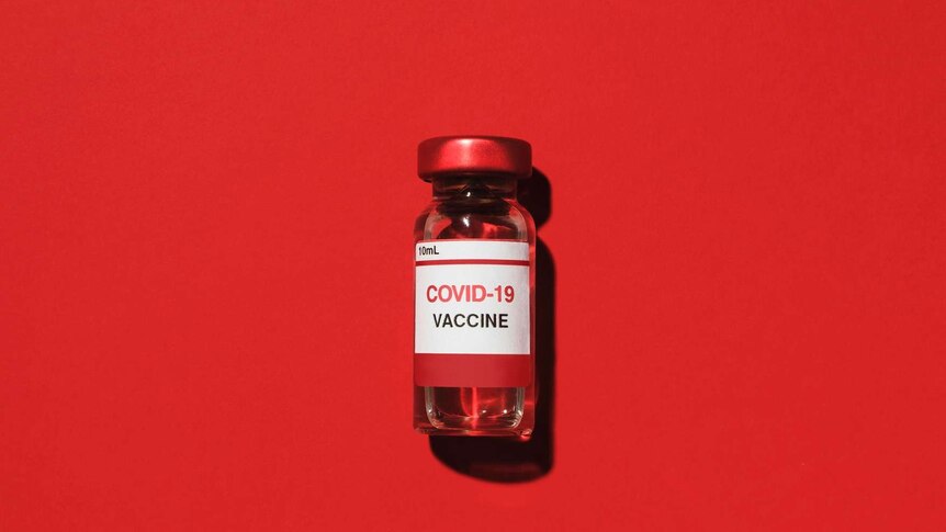 Studio shot of vial with Covid-19 vaccine.