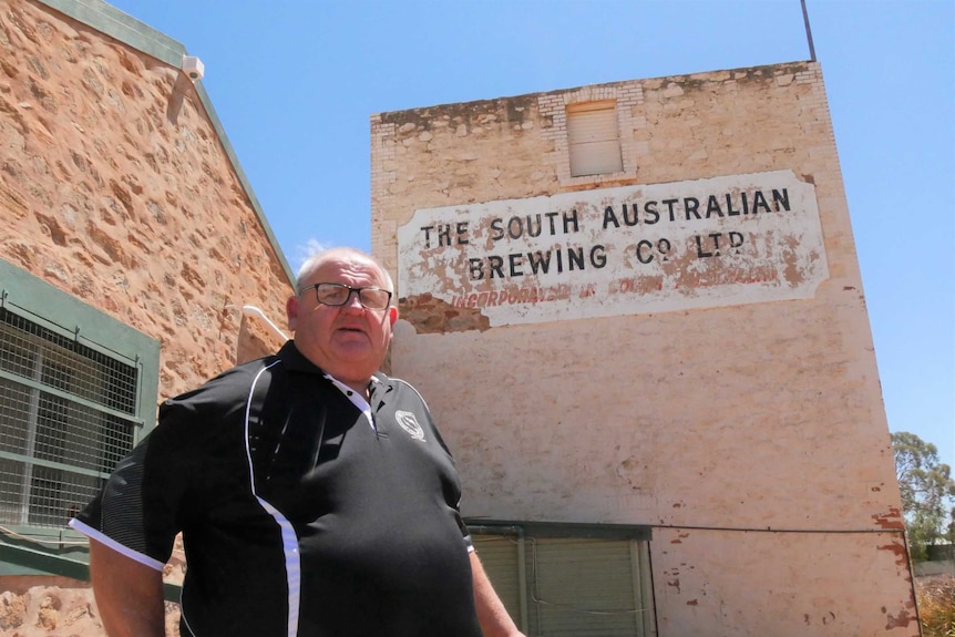 Broken Hill resident Paul Pearce in front of the city's old West End draught depot