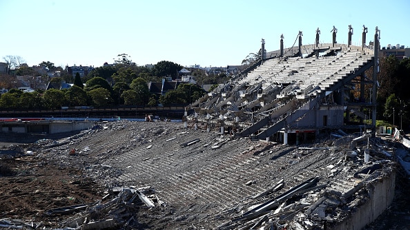 On a clear day, you view the partially-demolished rafters of the Sydney Football Stadium.