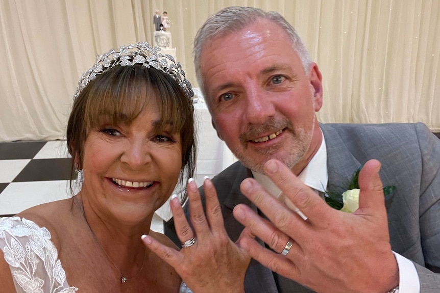 Diane Hughes and Ronald (Ron) Hughes smile at their wedding. They died in a Gold Coast helicopter crash on January 2, 2023