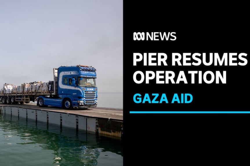 Pier Resumes Operation, Gaza Aid: A truck drives along a pier that extends into the sea.
