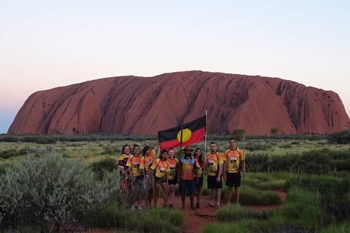 Clinton Pryor with Queensland students at Uluru.