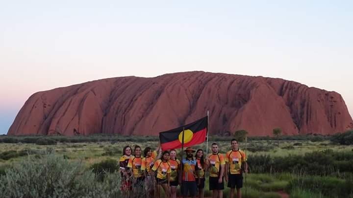 Clinton Pryor with Queensland students at Uluru.