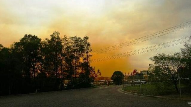 A dust plume over Muswellbrook after an explosion at BHP Billiton's Mt Arthur coal mine.