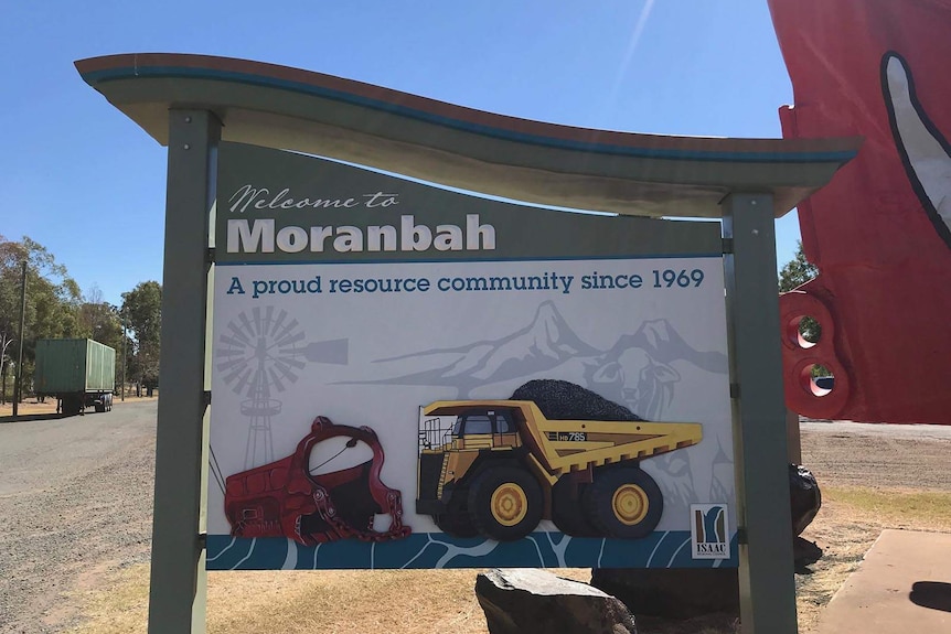 Moranbah town sign showing a coal mine truck