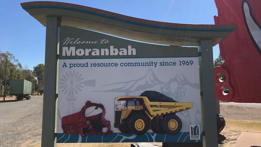 Moranbah town sign showing a coal mine truck