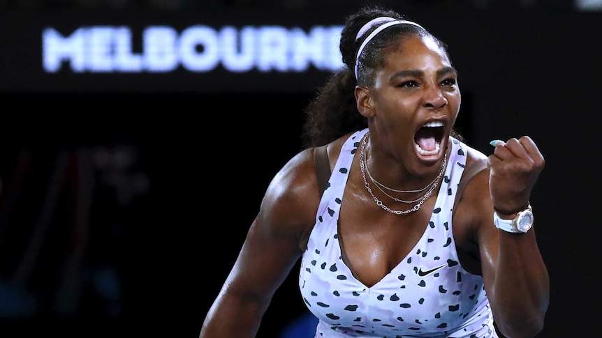 Serena Williams shouts and clenches her fist during her Australian Open match against Tamara Zidansek.