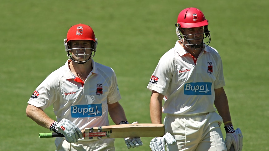 Redbacks batsmen Daniel Harris (L) and Michael Klinger (R) missed out on centuries on day one.