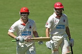 Redbacks batsmen Daniel Harris (L) and Michael Klinger (R) missed out on centuries on day one.