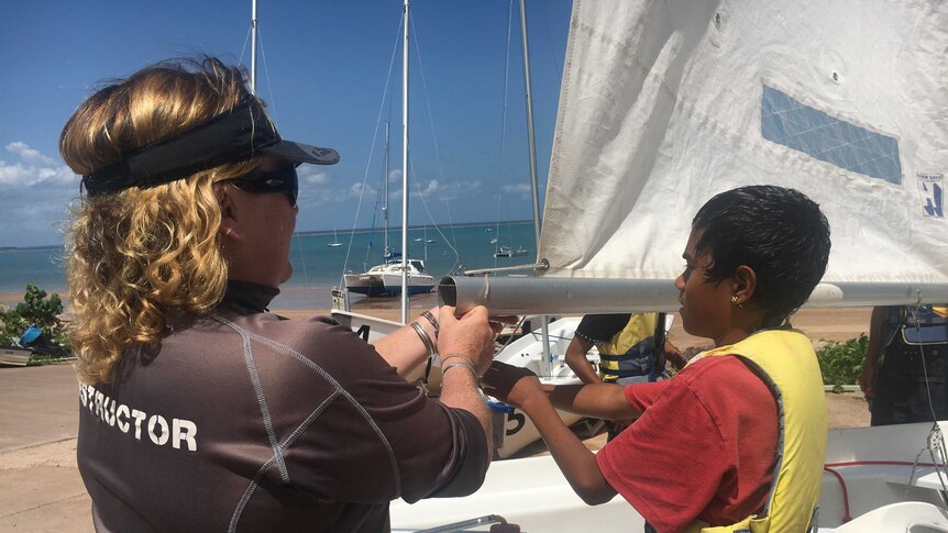 Course participant prepares for sail