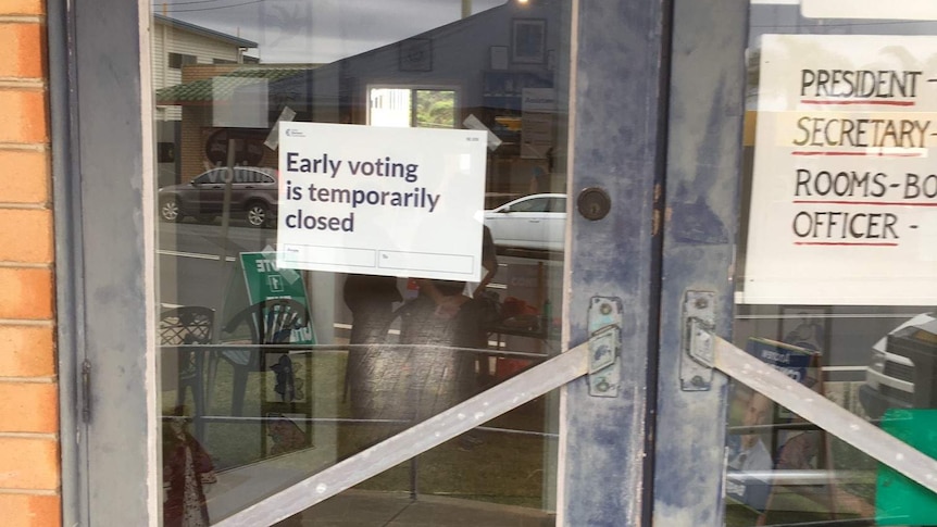 A sign saying voting is closed