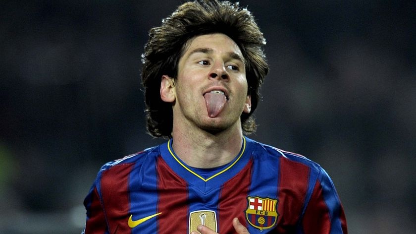 Barcelona forward Lionel Messi pokes his tongue out after missing a goal