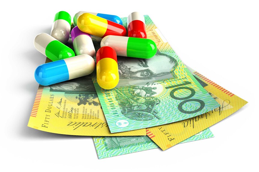 Colour pills on top of Australia dollar notes.