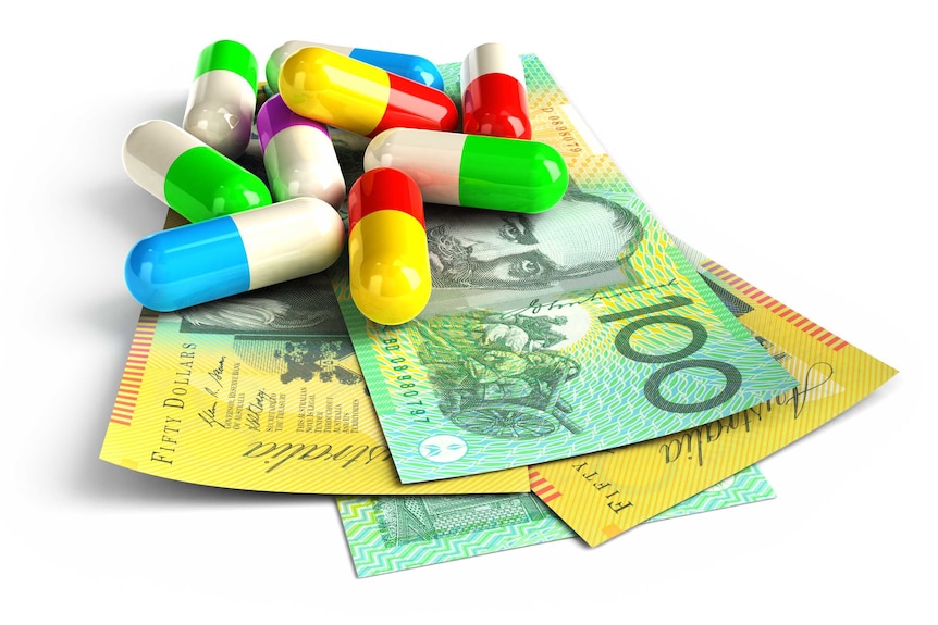 Colour pills on top of Australia dollar notes.