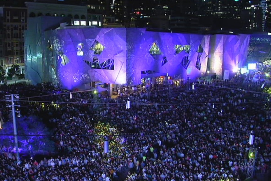 Crowds gather in Federation Square