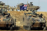 Australian operations: light armoured vehicles participate in a range day near Tallil Air Base, 2008.