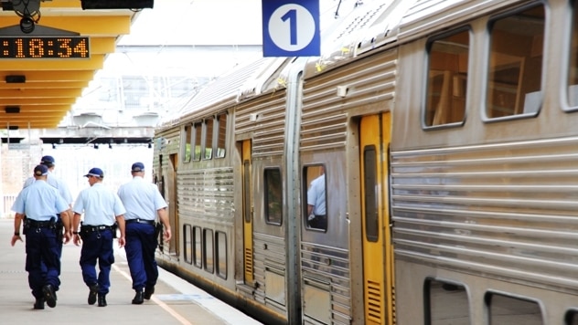 NSW Police Transport Command officers and train