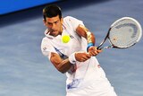 Djokovic fights back to win