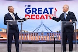 Anthony Albanese and Scott Morrison point at each other while debating on a TV set