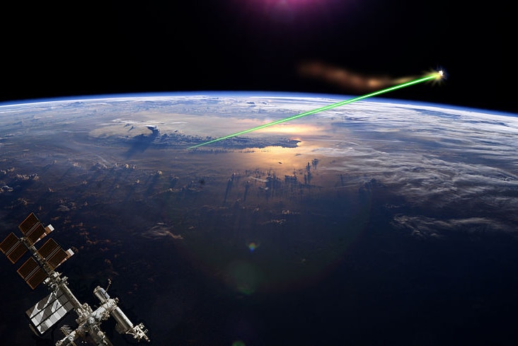 An artists impression of a ground-based laser that would be used to move debris.