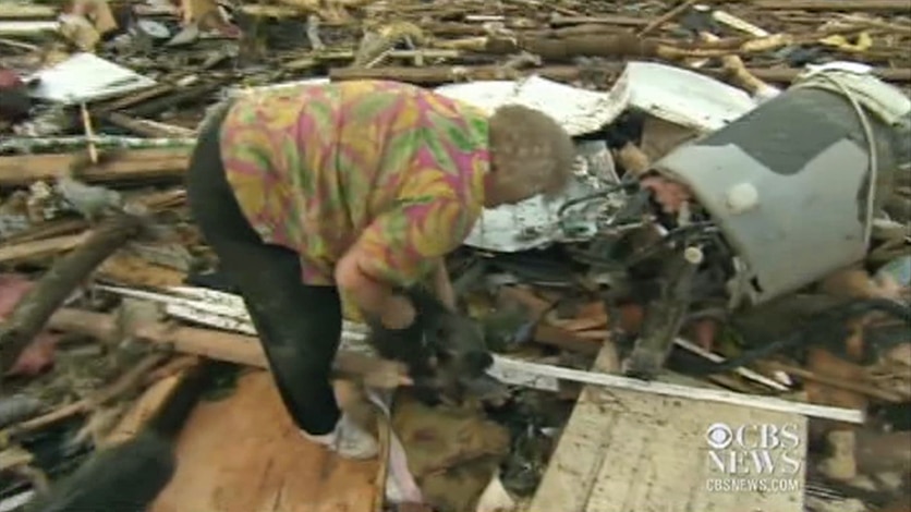 Oklahoma woman finds her dog under tornado debris.