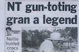 Photo of a newspaper page featuring black and white photo of short elderly woman holding a shotgun