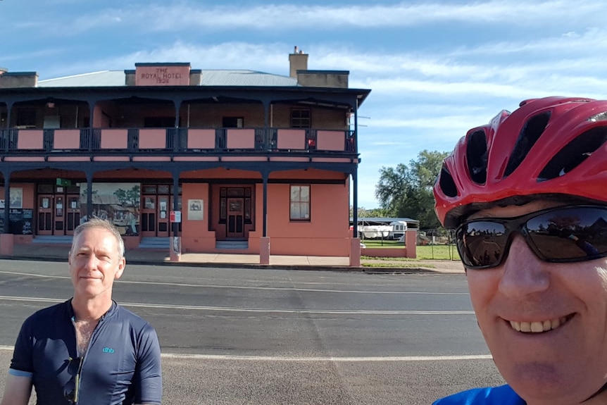 One man takes a selfie outside the Mendooran Hotel.