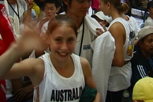 Libby Hall waves to the camera.