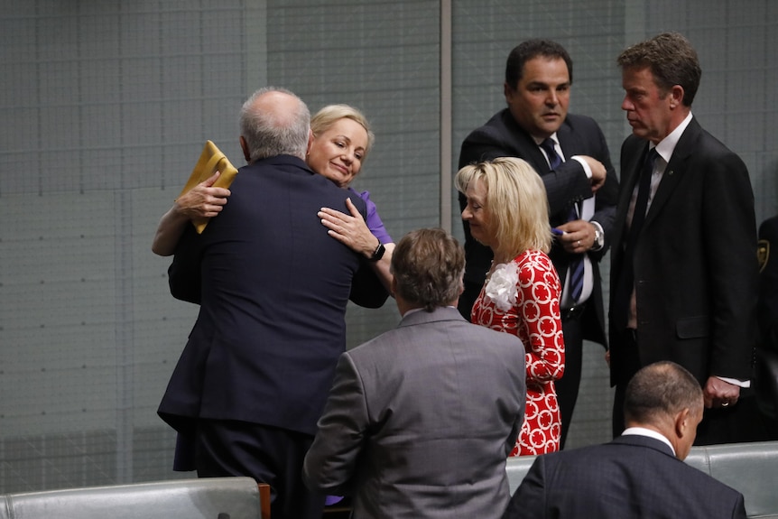 Sussan Ley and Scott Morrison hug in the house of representatives
