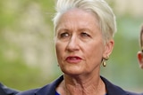 Federal member for Wentworth, Dr Kerryn Phelps, looks off into the distance at a press conference.