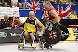 Competitors from Britain and Australia collide in a game of wheelchair rugby