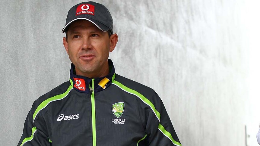 Ricky Ponting walks to a press conference with his daughter