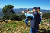 Chief Justice Terence Higgins looks out from Mt Coree in the Brindabella National Park during a visit last week.