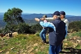 Chief Justice Terence Higgins looks out from Mt Coree in the Brindabella National Park during a visit last week.