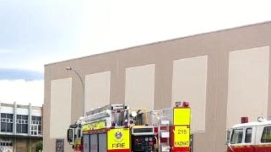 Emergency services crews gather outside the Metro5 cinema complex in Bathurst