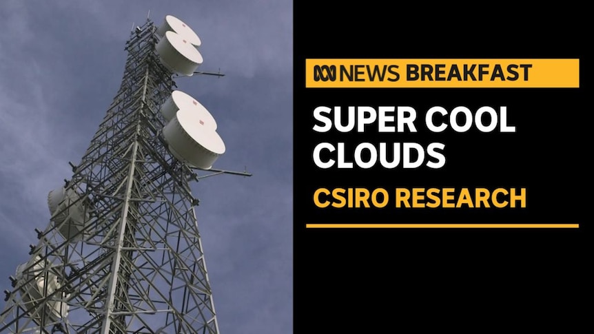 Super Cool Clouds, CRISO Reearch: Tower fitted with numerous satellites high looking up towards blue sky with white clouds.