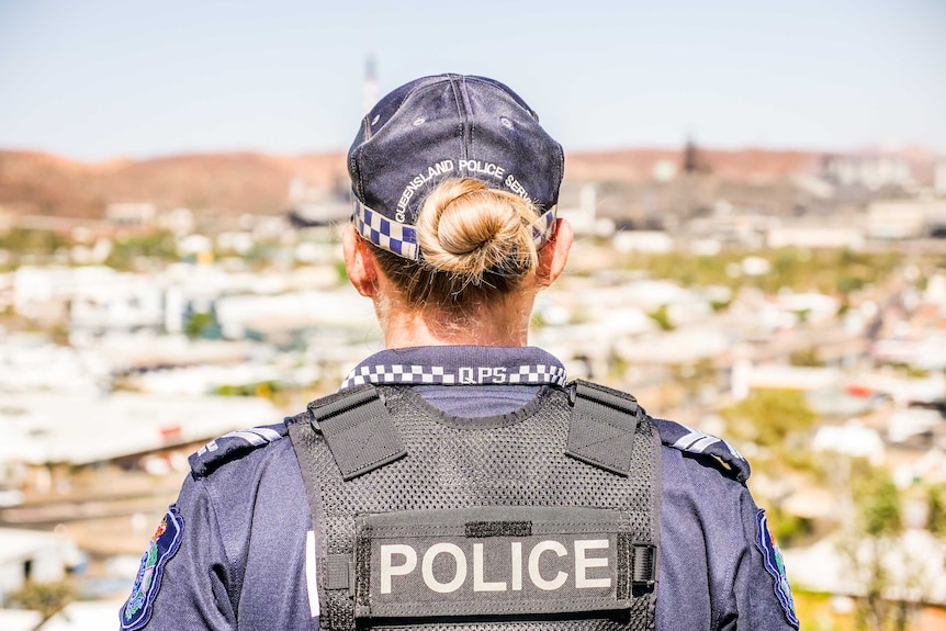 Acting Senior Constable Aimee Sewell looks out over the town on a bright sunny day.