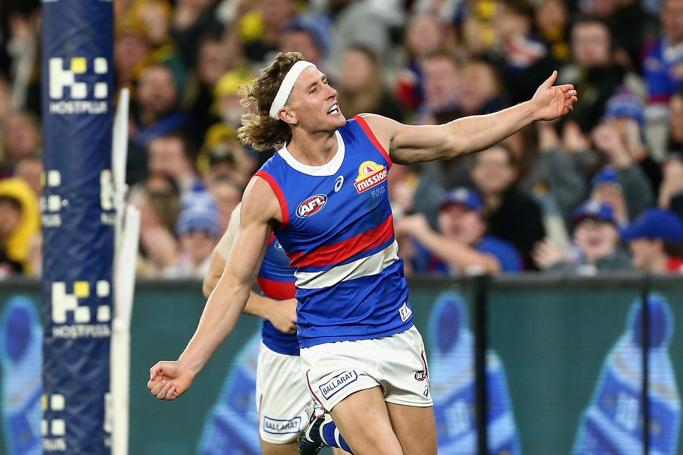 Tigers count the cost of horror 91-point AFL loss as Bulldogs relieve ...