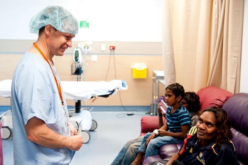 Dr Tim Henderson meeting with patients.