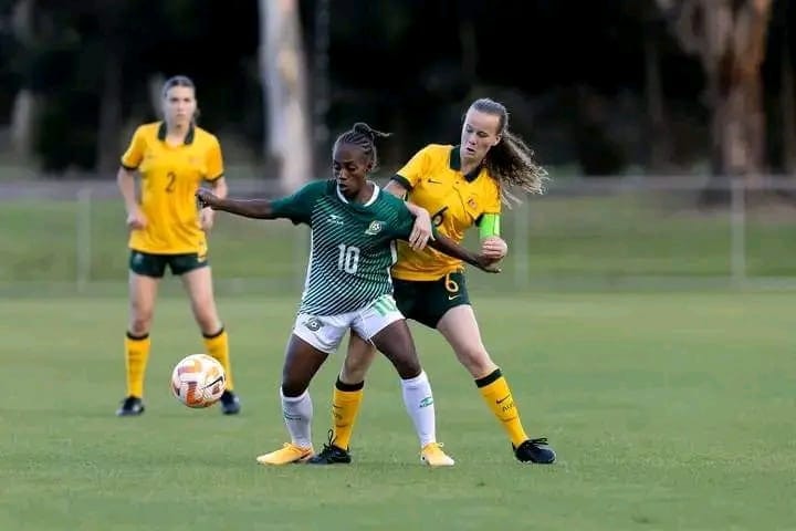 Ileen Pegi, captain of the Solomon Island's women's football team, plays soccer against opponents.