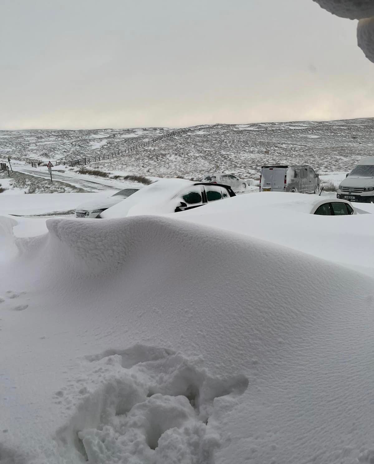 Oasis tribute band fans spend three days snowed in at Tan Hill Inn in