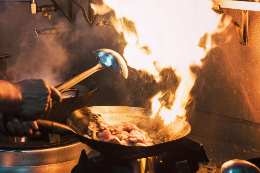 A chef at Tarim preparing food for their iftar meal during Ramadan.