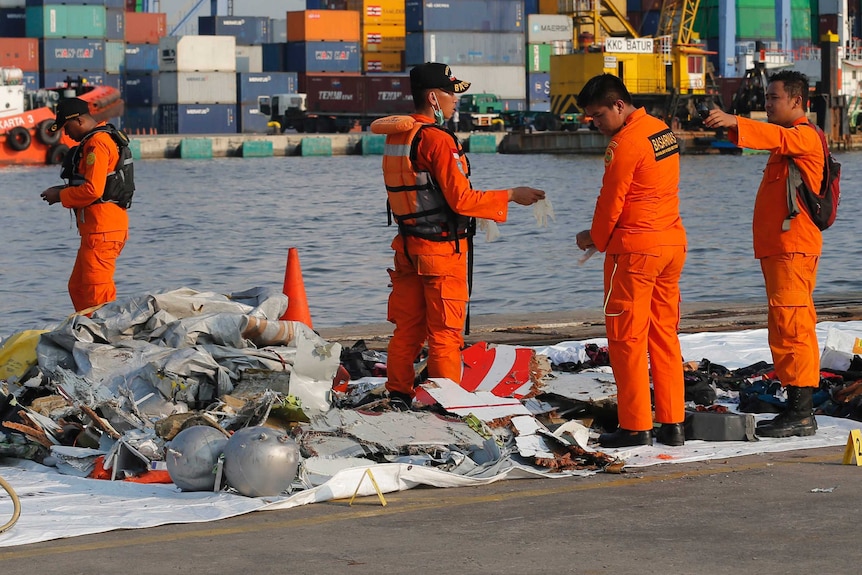 Indonesian Search and Rescue Agency inspect debris recovered from the waters where the Lion Air plane has likely crashed.