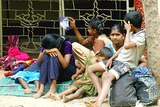 An internally displaced Tamil family rests at a welfare center in Batticaloa, Sri Lanka.
