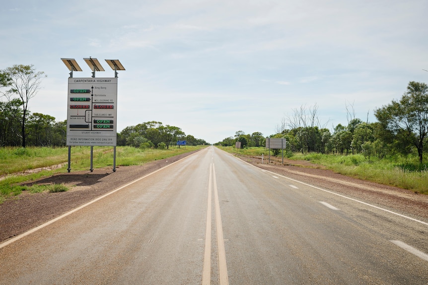 An outback highway with sign 