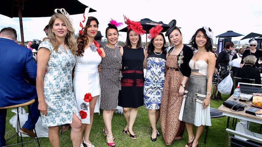 Women from across Asia and Australia wear dresses, fascinators at the Melbourne Cup.