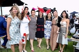 Women from across Asia and Australia wear dresses, fascinators at the Melbourne Cup.