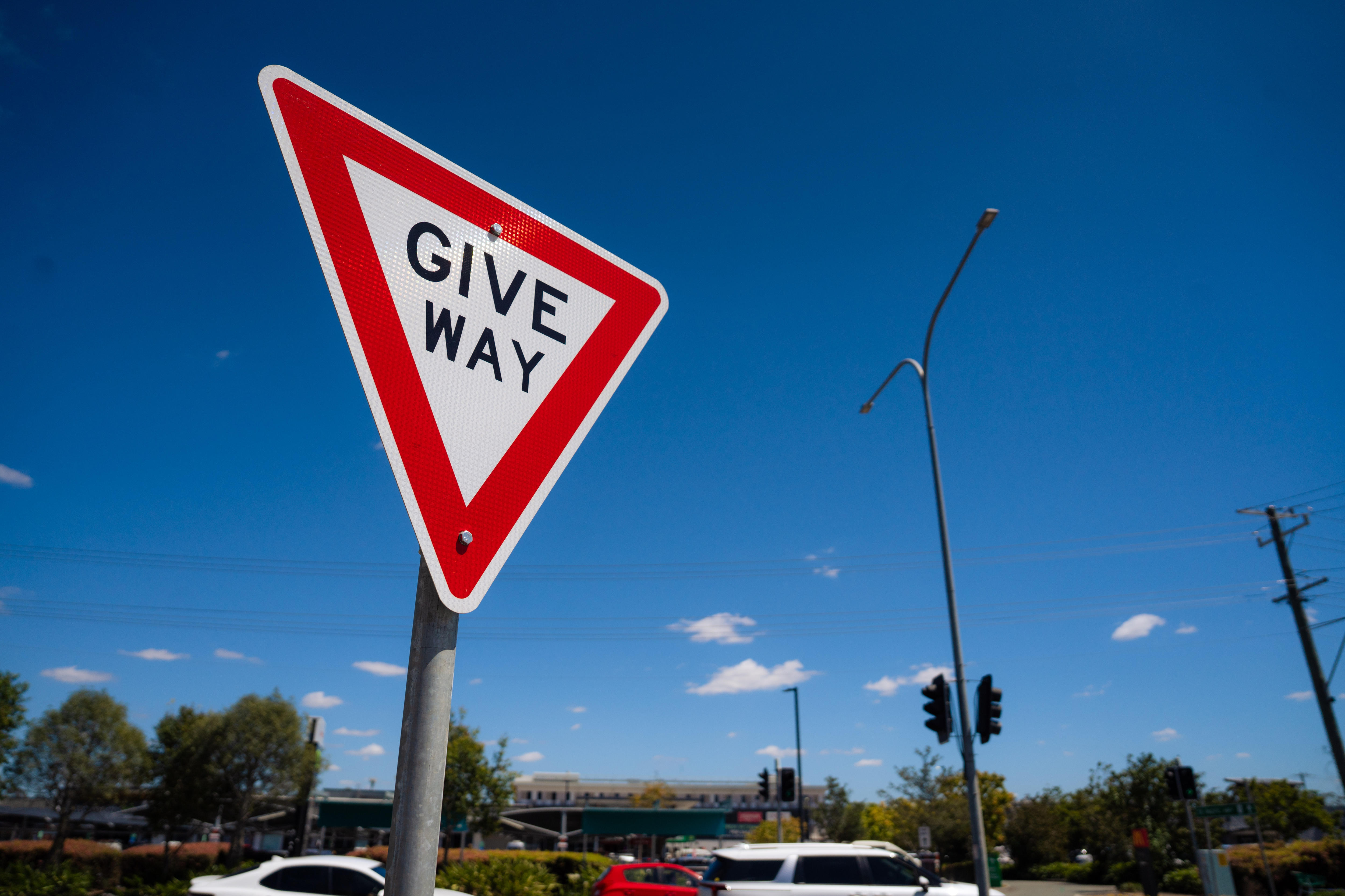 a give way sign on a sunny day in brisbane