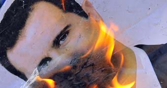 Al nusra assad pic burning