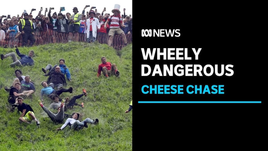 Wheely Dangerous, Cheese Chase: A group of men seen rolling down a hill as a large group watches